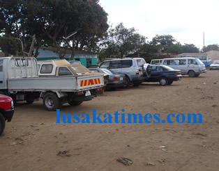 file:A typical police Station in Lusaka with some vehicles parked for security reasons