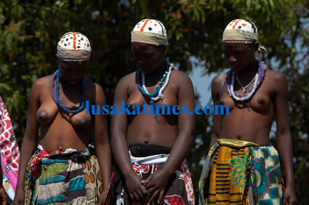 Shy girls...initiates wait for instructions before showcasing a traditional dance