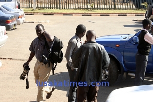 Some editorial staff from the Post Newspaper arrive at the Lusaka magistrate Court where they were summoned to appear