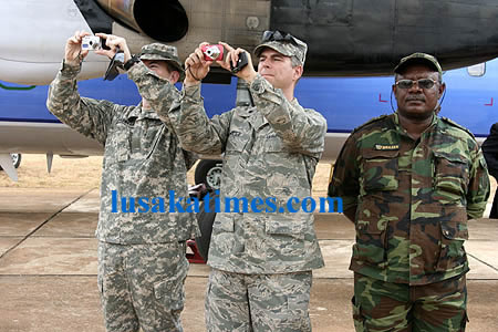 Two soldiers from US airforce shooting pictures of President Banda when he arrived for a two day working visit at Chipata airport