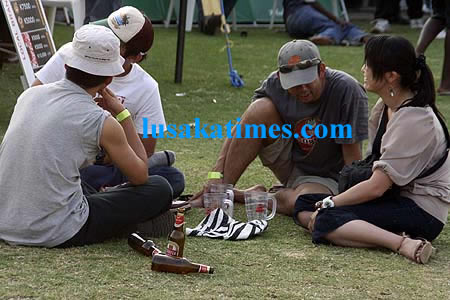 Some people captured during a beer festival in Lusaka