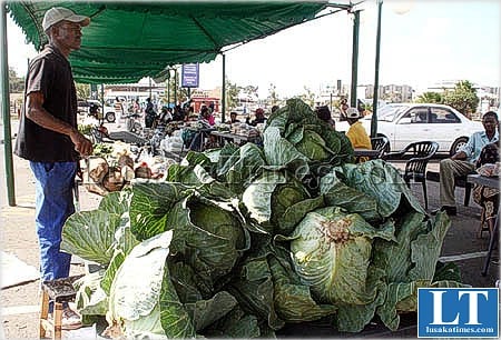 A farmer displays agricultural produce during an exbition at Arcades shoping centre in Lusaka. This is part of the independence celebrations in Lusaka