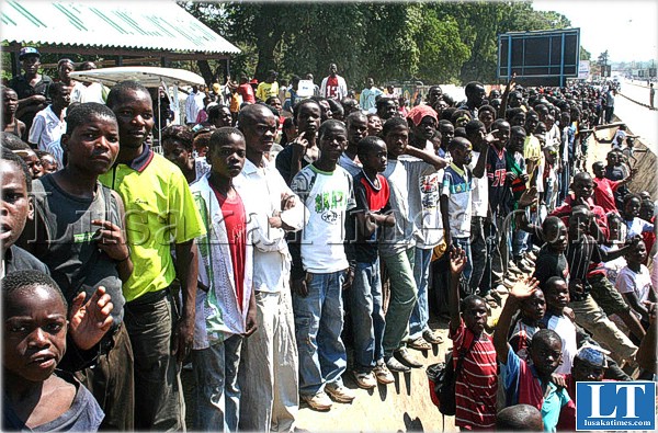 Children and other gate crushers trying to gain entry into the Lusaka show grounds where Zambia's 45th independence celebrations were held