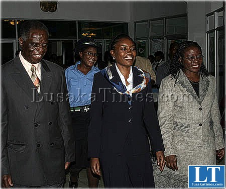 First Lady Thandiwe Banda (c) vice president's wife Ireen Kunda (r) and presidential Affairs minister Ronald Mukuma spotted at Mulungushi conference centre in Lusaka