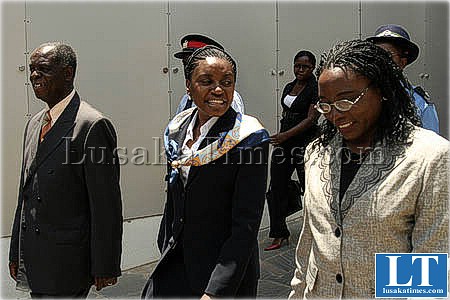 First Lady Thandiwe Banda (c) vice president's wife Ireen Kunda (r) and presidential Affairs minister Ronald Mukuma spotted at Mulungushi internationa conference centre in Lusaka