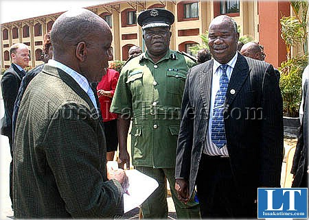 Home Affairs Minister Lameck Mangani, Inspector General of Police Francis Kabonde  police spokesperson Bonny Kapeso (l) after opening seminar on small arms in Lusaka