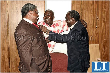 MMD Solwezi central parliamentary candidate Albert Chifita (r) is congratulated after being adopted to contest the by-election in November this year