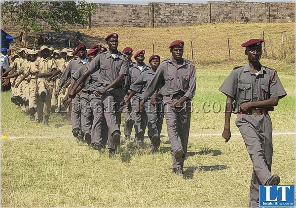 Maamba mine police and the Maamba High School cadet during the  Independence Day celebration at Kanzize Stadium in Maamba Township