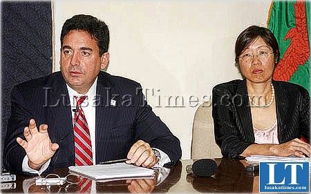 Millennium Challenge Corporation acting vice president Darius Teter is and Senior Director Kyeh Kim (r) at a press briefing in Lusaka
