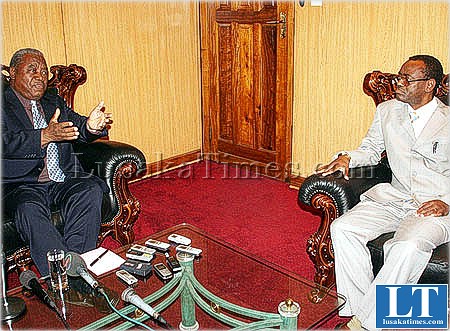 President Banda talks to journalists with vice president George Kunda before he left for Uganda