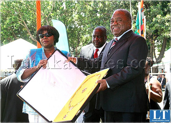 President Rupiah Banda presents the Order of the Eagle of Zambia - First Division award to late south African freedom fighter Oliver Tambo's daughter Nomatemba