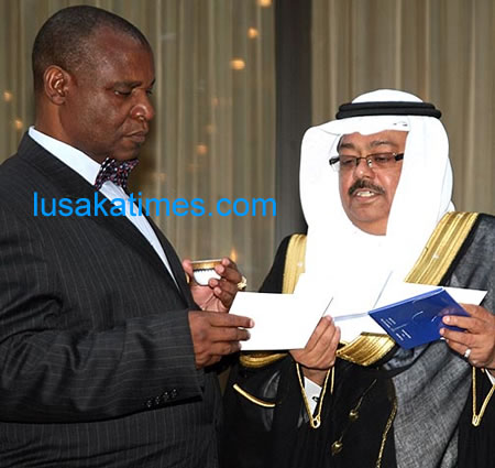 Community Development and Social services Minister Micheal Kaingu shares notes with Saudi Arabia ambassador to Zambia Hassan Attar during that country’s 77th national day