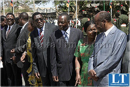 Some permanent secretaries waiting inthe sun to shake President Banda's hand at the freedom statue