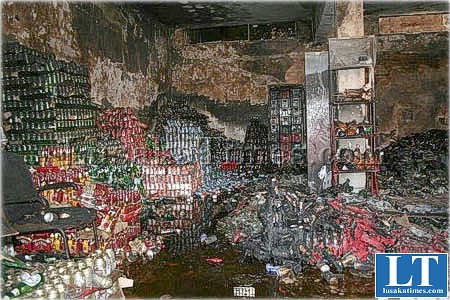 Volumes of liquor and other intoxicating drinks after they were burnt in a store that caught fire in Ndola