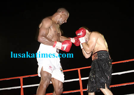 Zambia's charles Wasaja' Chisamba about to pound Tunisia's Faisal Arrami during the African Boxing Union fight in Lusaka. Arrami won by knock ou