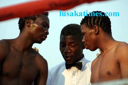 Zambian Precious Makina (l) and South African size eachother before a boxing match at Nationalist stadium in Lusaka.