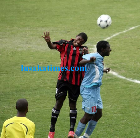 Zanaco and Red Arrows' players in an aerial tussle during the KCM-FAZ league game at Sunset stadium in Lusaka