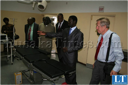 Executive Director Andrew Silumasii introducing Zambia – Zimbabwe Ambassador Dr. Ludek Zahradnicek in the theater room during the official hand over of medical equipment at Lewanika General Hospital.