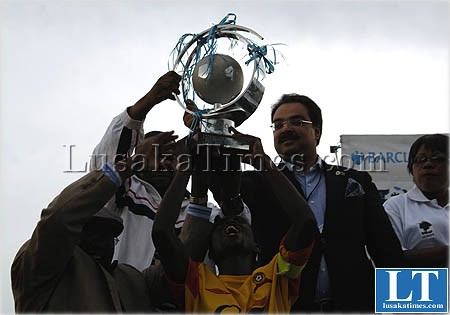 Power Dynamos players and Barclays bank Zambia managing director Masud Zafar hoist the Barclays cup trophy Power Dynamos players and Barclays bank Zambia managing director Masud Zafar hoist the Barclays cup trophy