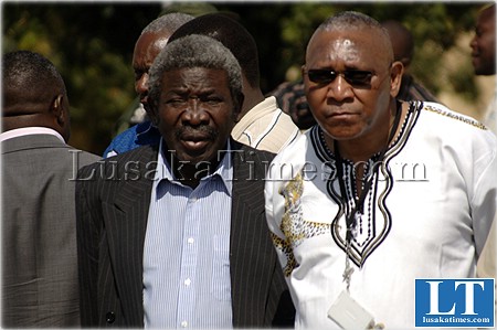 Resurfaced...former community development minister Steven Manjata (l) and State House Chief of Staff Sichinga in a queue after seeing off President Banda in Lusaka Resurfaced...former community development minister Steven Manjata (l) and State House Chief of Staff Sichinga in a queue after seeing off President Banda in Lusaka