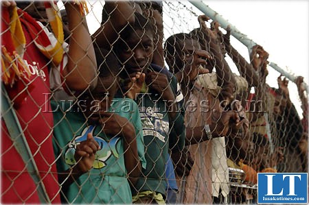 Soccer fans watching the Barclays cup final match between Power Dynamos and Green Buffaloes at Nkoloma stadium Soccer fans watching the Barclays cup final match between Power Dynamos and Green Buffaloes at Nkoloma stadium