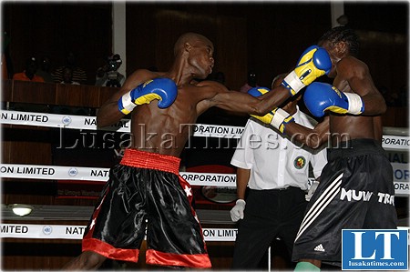 Tanzania's Rhamadan punches Zambia Kennedy Kanyanta during the bantam weight fight in Lusaka Tanzania's Rhamadan punches Zambia Kennedy Kanyanta during the bantam weight fight in Lusaka
