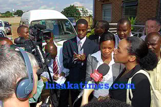 Post newspaper editor Chansa Kabwela talks to journalists after she was acquitted by the Lusaka magistrate court