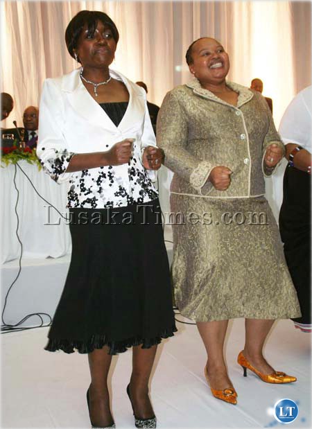First Lady Thandiwe Banda and Mrs Nompumelelo Zuma dance during the State Banquet hosted for President Jacob Zuma