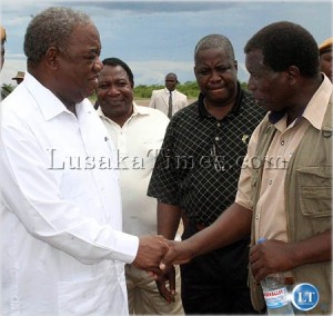 How are you feeling...President Banda greets western province MMD chairman Simasiku Namakando in Mongu