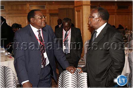 Chief Justice Ernest Sakala (r) listens to High Court Justice Munalula Lisimba during the Judicial Integrity in Africa regional workshop in Lusaka Chief Justice Ernest Sakala (r) listens to High Court Justice Munalula Lisimba during the Judicial Integrity in Africa regional workshop in Lusaka