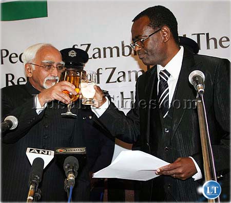 Mr George Kunda with one hand clutched to a speech proposes a toast to vice president of India Hamid Ansari during a State banquet in Lusaka Mr George Kunda with one hand clutched to a speech proposes a toast to vice president of India Hamid Ansari during a State banquet in Lusaka