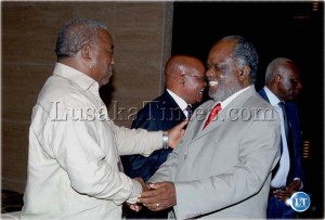 President Rupiah Banda shakes hands with Namibian President Ipukefinye Pohamba at Teratona Hotel in Angola