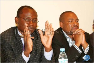 Press Association of Zambia vice president Amos Chanda  (left)