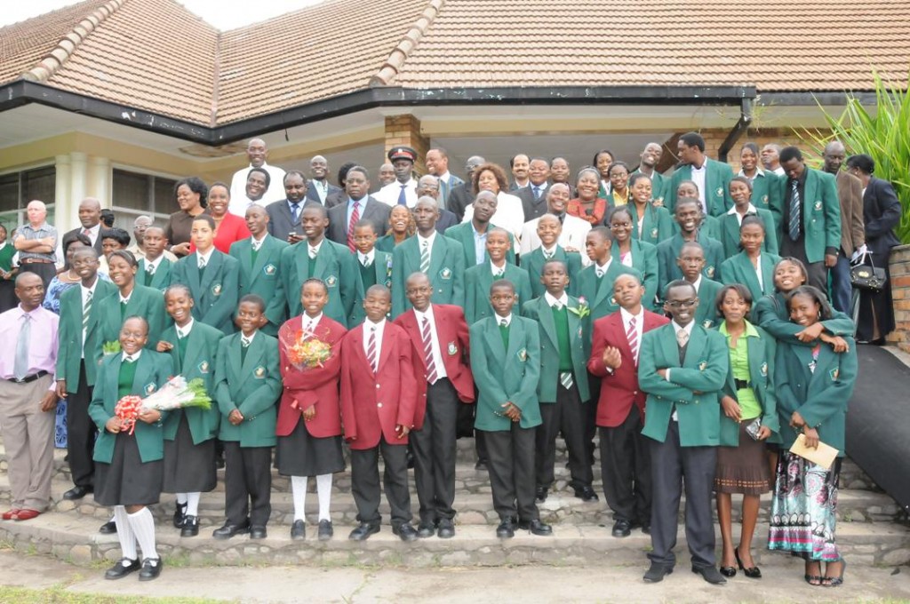File:Copperbelt Permanent Secretary Villie Lombanya with KCM and Government Officials and the students who received the KCM scholarships