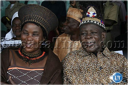 Paramount chief Chitimukulu and his wife Shipikisha follow proceedings during the Ncwala