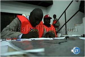A polling agent compiling the number of votes