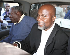MMD National Secretary and Former Finance Minister Katele Kalumba (R) on his way to jail