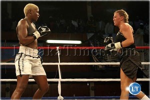 Esther Phiri (l) and Duda Yankovich squaring each other during the WIBA fight in Lusaka