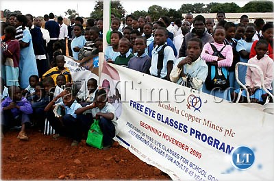 Some pupils in Nampundwe pose for a photograph after receigin free eye sreening from Konkola Copper Mines