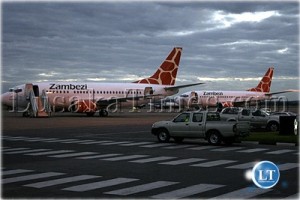 Two Zambezi Airlines planes on the tarmac at Lusaka International Airport