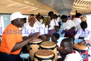 A traditional dance troupe performing inside one of the carriages on the maiden train journey from Malawi to Chipata during the launch of the Chipata-Muchinji railway line.