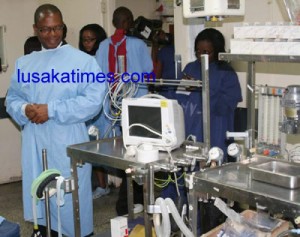 Health Minister Kapembwa Simbao inspects equipments in one of the theatres at University Teaching Hospital