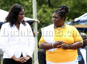 Gender Minister Sarah Sayifwanda talks to United Nations Development Programme Country Director Viola Morgan during the launch of 16 days of activism against gender based violence in Lusaka