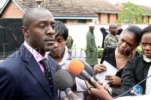 Drug Enforcement Commission spokesperson John Nyawali tlking to journalists outside the commission's offices in Lusaka