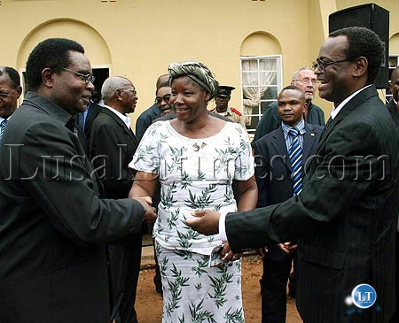 Heritage Party leader Godfrey Miyanda and Forum for Democracy and Development leader Edith Nawakwi meet vice president George Kunda at the funeral of the late All people's Congrees Party leader Ken Ngondo