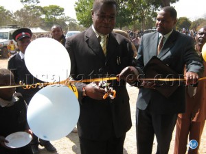 Central province minister Ackimson BANDA cuts a robbon of a newly constructed classrom block at Chikanda basic school in Mumbwa district Central province minister Ackimson BANDA cuts a robbon of a newly constructed classrom block at Chikanda basic school in Mumbwa district