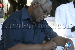 TAZARA managing director Akashambatwa Mbikusita Lewanika signs the book of condolence