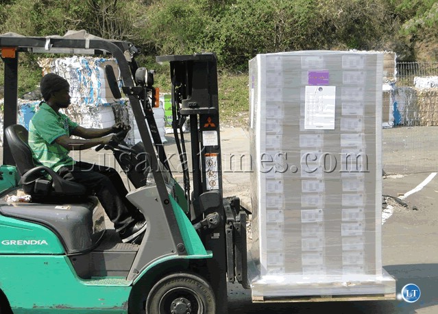A folk lifter moves a parlet of ballot papers from the UNIPRINT warehouse on to the truck for transportation to King Shaka Airport