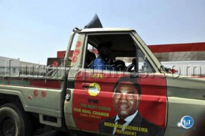 A van with campaign stickers for opposition UPND leader Hakainde Hichilema makes its way along Malambo road in Lusaka