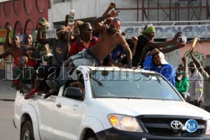 Lusaka residents celebrate the victory of President Sata
